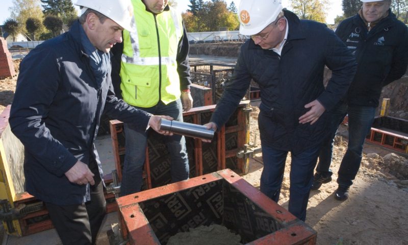 Immurement of capsule in the foundations of Sigulda Sports Hall signifies beginning of large scale construction works